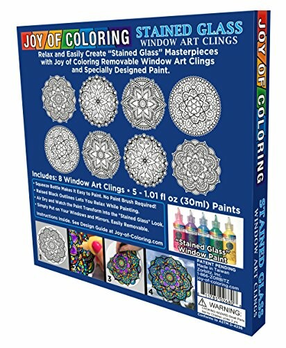 Joy of Coloring stained glass window art clings package with paints and designs.