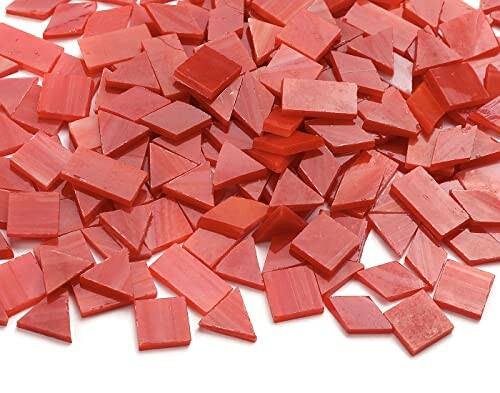 Red glass mosaic tiles in various shapes.